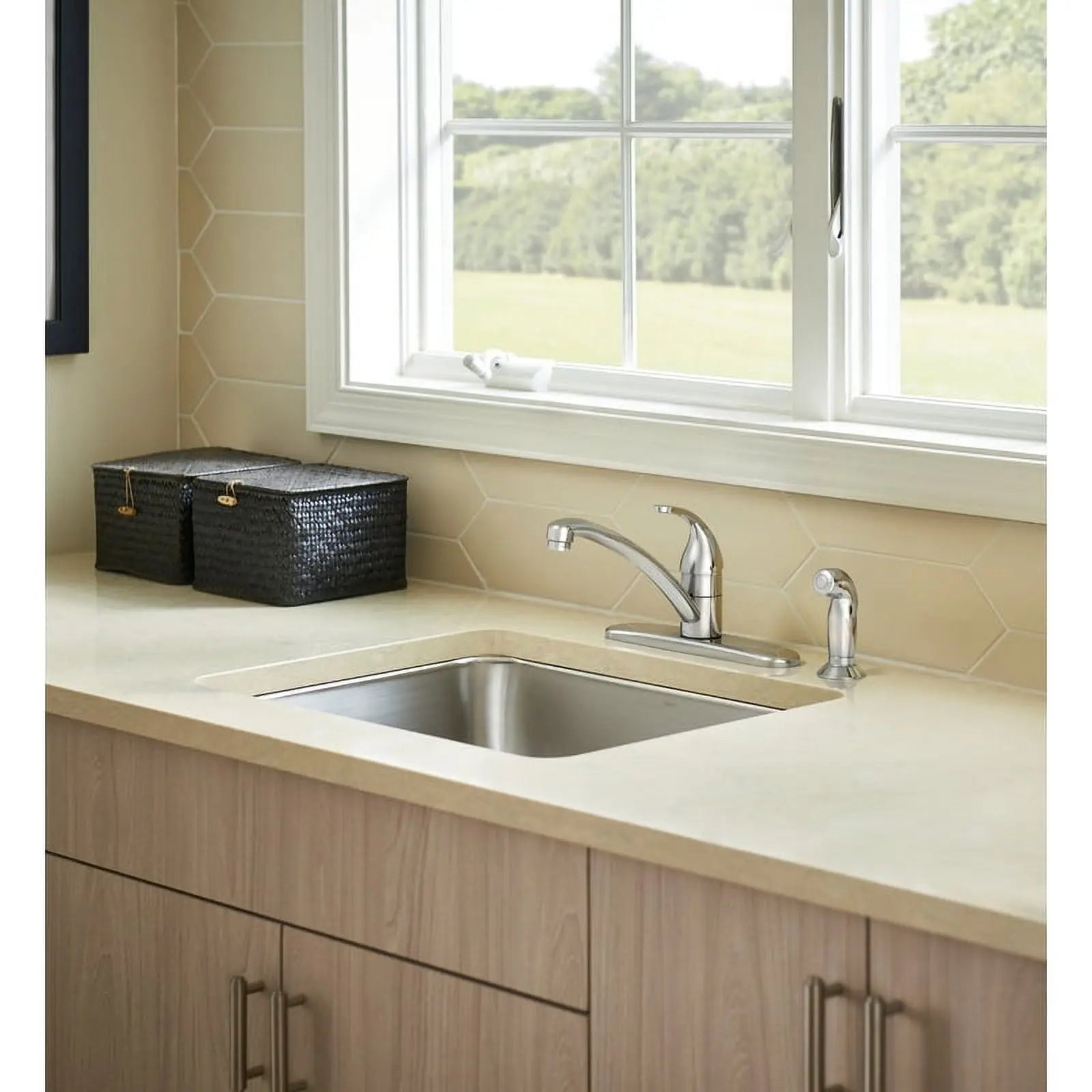 Moen Adler faucet with side sprayer on a countertop