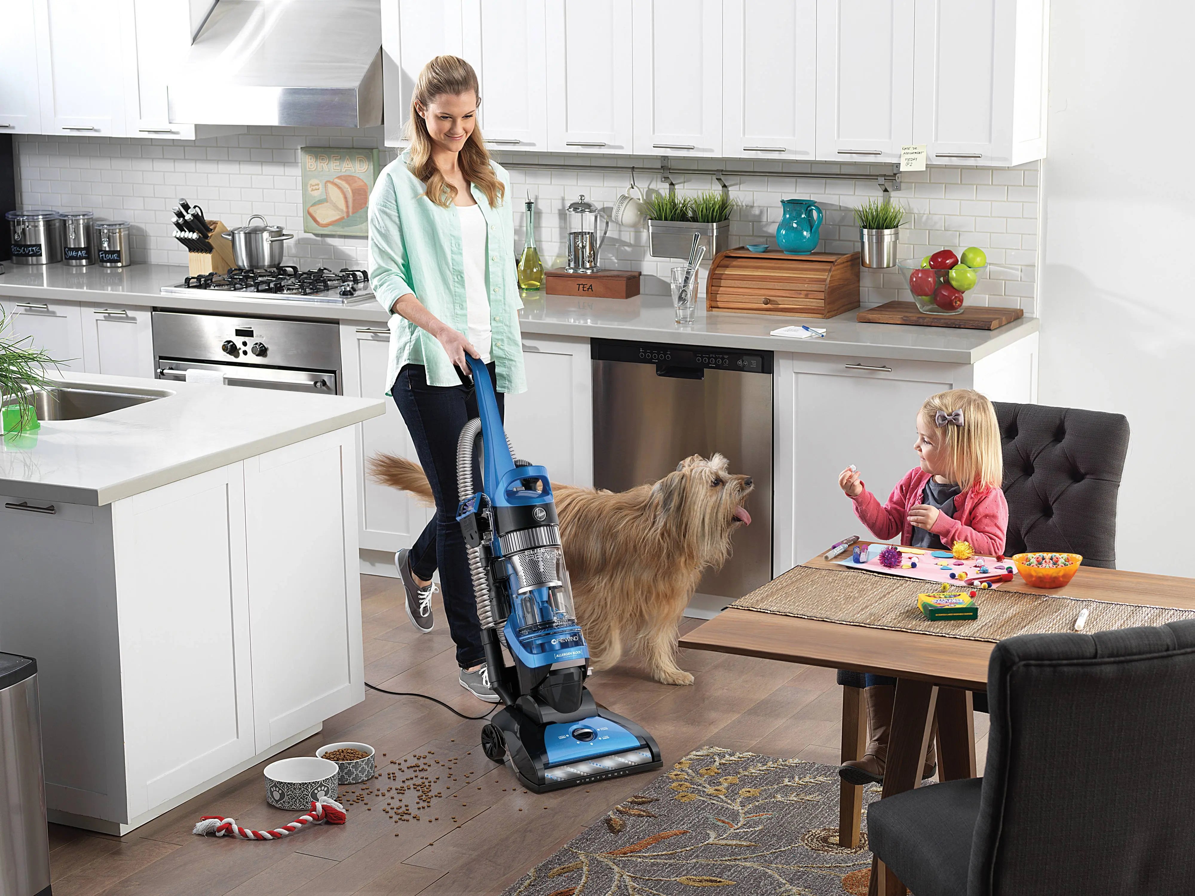 Side view of Hoover Elite Rewind Plus vacuum showcasing dirt cup capacity
